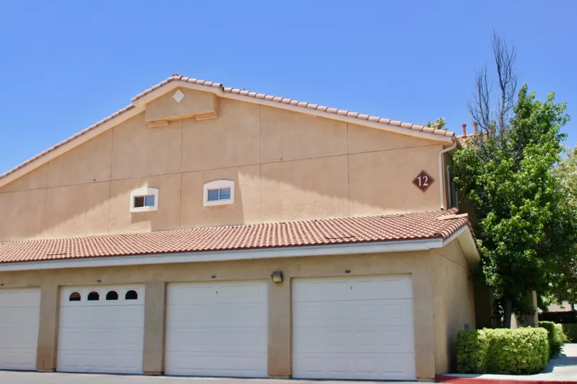 A grand bungalow in Madison Park Villas, with it's white gate storage spaces, murrieta, California