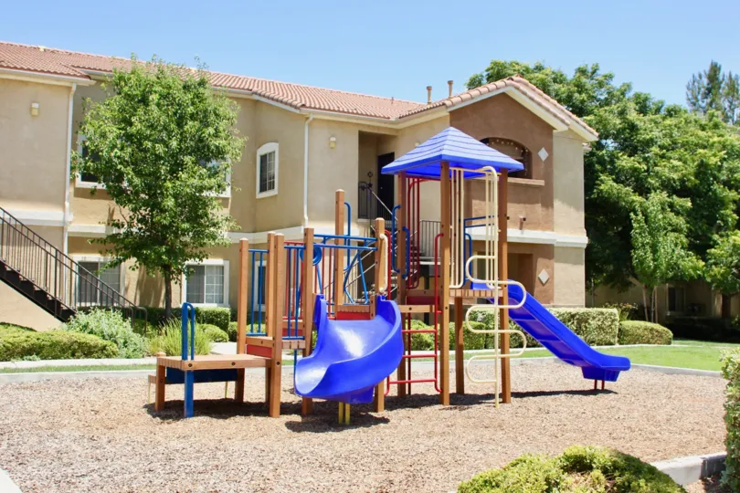 A sunny day in the Alta Murrieta park with children's playground and picnic tables