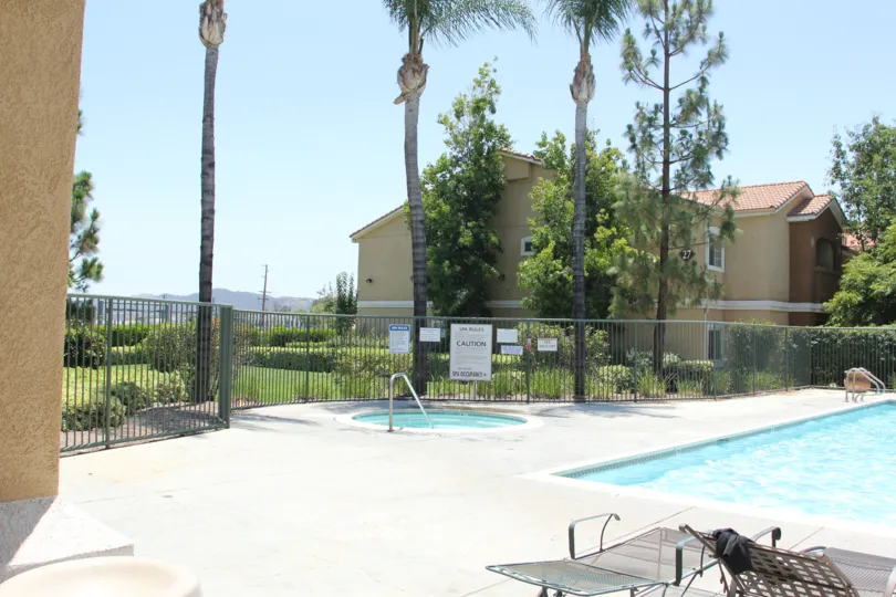 The madison park villas are with palm trees and also with swimmingpool