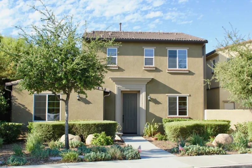 A beautiful yard landscaped to conserve water in the Faseos at Crown Valley community.