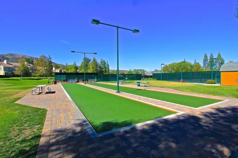 Green area with picnic benches and recreation area nested in the california mountains