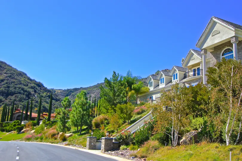 A street in the Retreat at Bear Creek on a sunny day.