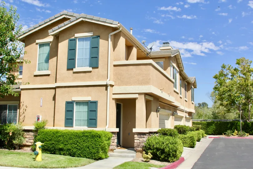 Side view of one of the apartment buildings at Villas at Old School house in Murrieta CA.