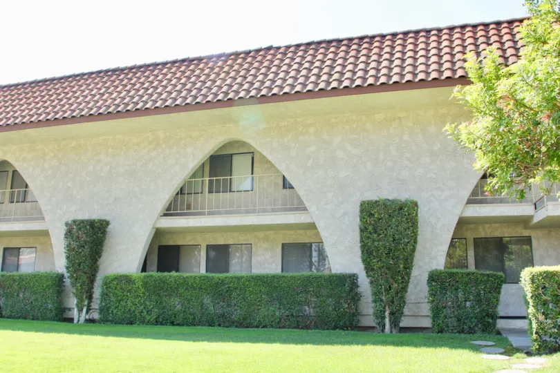 Arches reach from the bottom to the second floor on a condo building at Country Club Villas.