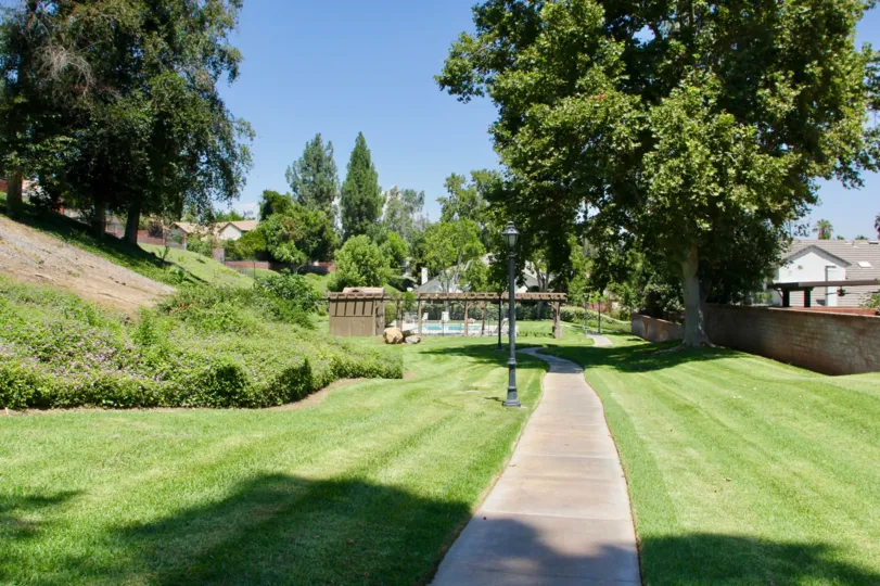 A walkway sits partially in the shade at the Crawford Country Estates.