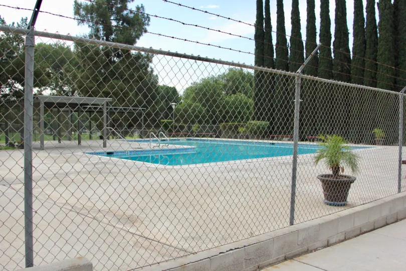 Nice sunny day and nice pool come swim with us at the Country Club in California