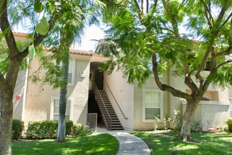 A housing with a second floor entrance in Sonata at Canyon Crest community.