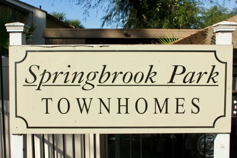 The sign for the Springbrook Park Townhomes located in Riverside, California