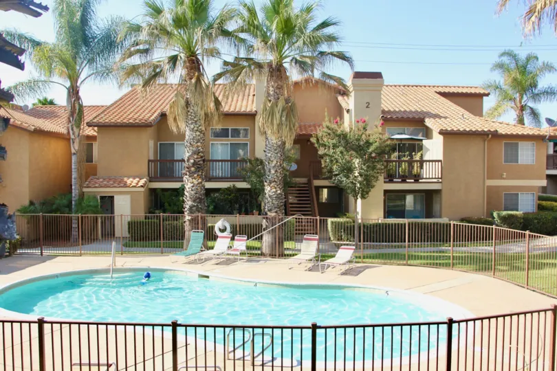 Beautiful Palm Valley Condos with swimming pool and palm trees