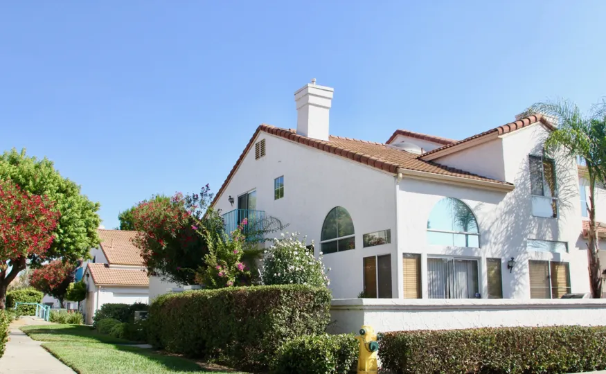 Two arched window sit on a townhome at Rancho Del Mar.