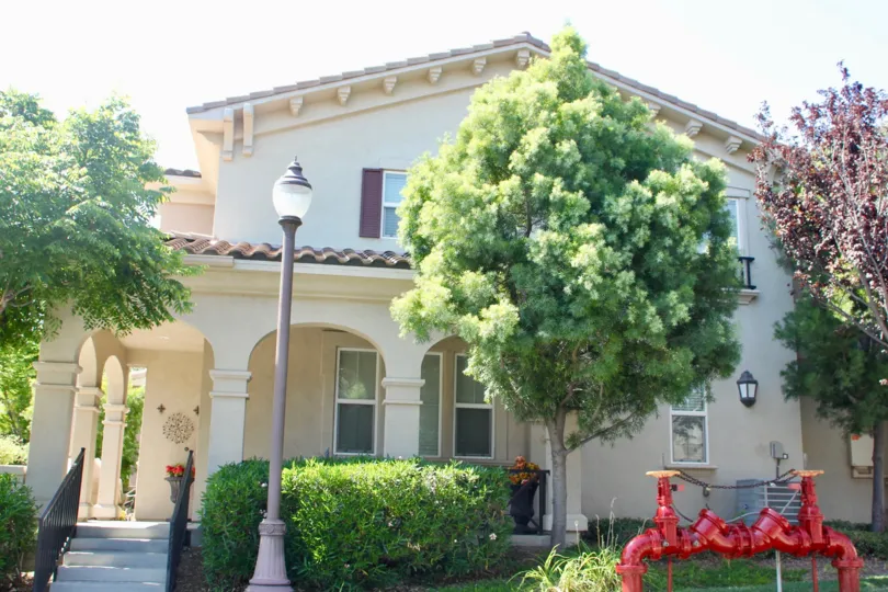 Savannah at Harveston temecula California palace like building structure found inside dense trees gives forest appearance