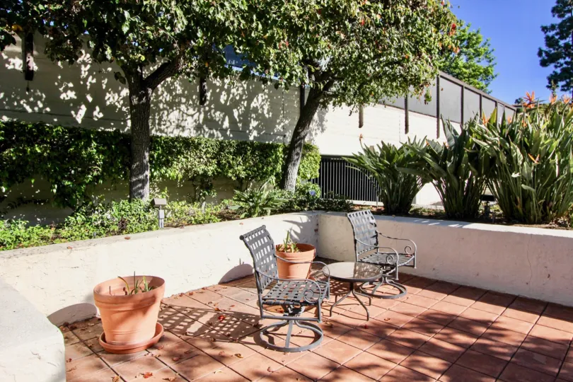 A nice California day in Carlsbad with a couple of chairs and tables to enjoy the sun