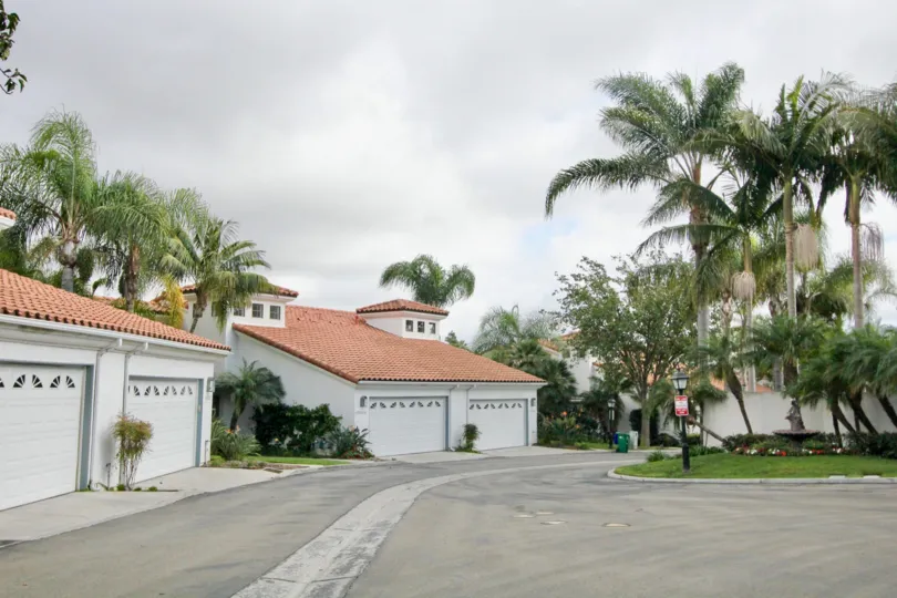 Matching garage doors lining a road in Bel Azure, Carlsbad, CA