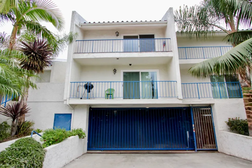 a black grill sitting on the balcony of Bristol Cove community in Carlsbad, CA