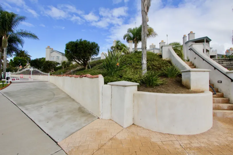 A driveway with curved seating in Buena Vista Village neighborhood.