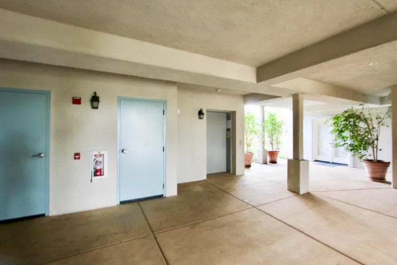 Doors and an elevator in the Buena Vista Village Community in Carlsbad, CA.