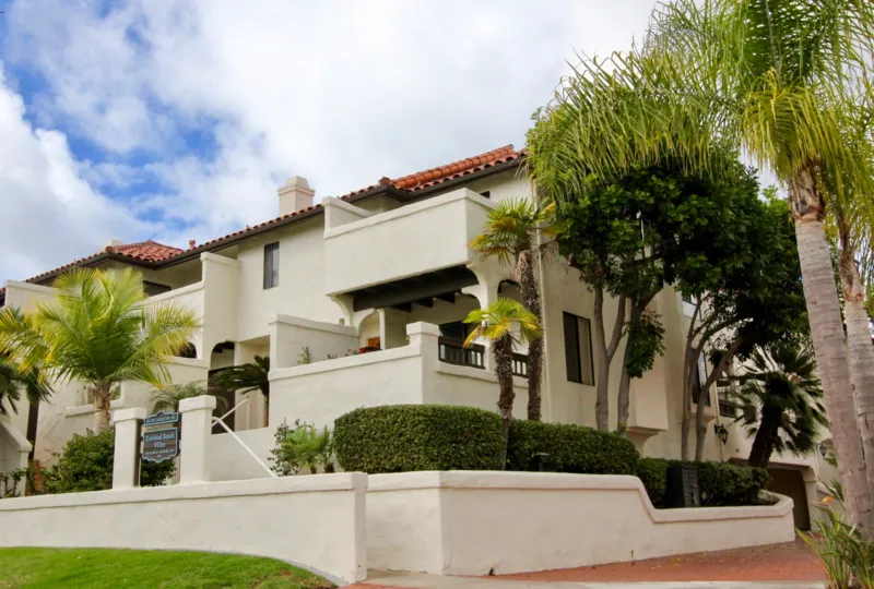 An outside view of Carlsbad Beach Villas apartments.