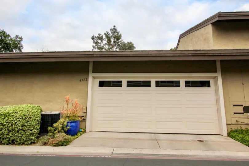 THE 4722 APARTMENT IN THE CARLSBAD PALISIDES WITH THE FLOWER POT, SHUTTER, PLANTS