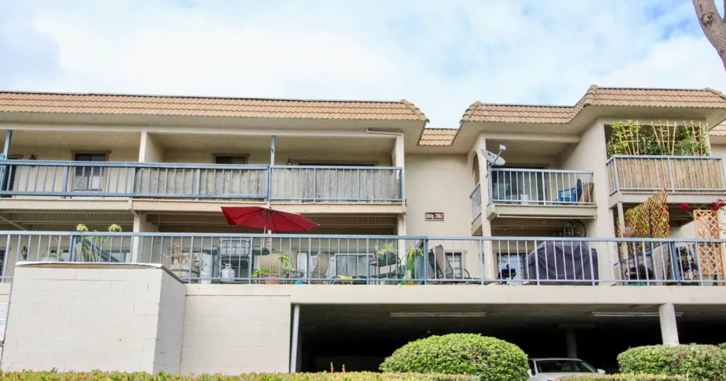 View of outside swimming gate and balcony at a Casa Grande hotel