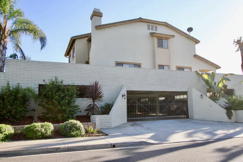 A gated residence in the Centalla Meadows community of Carlsbad California on a sunny day.