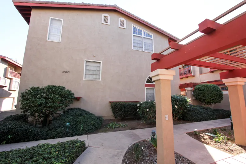 THE 2565 APARTMENT IN THE FAIRWAYS SOUTH WITH THE PLANTS, TREES, PATHWAY