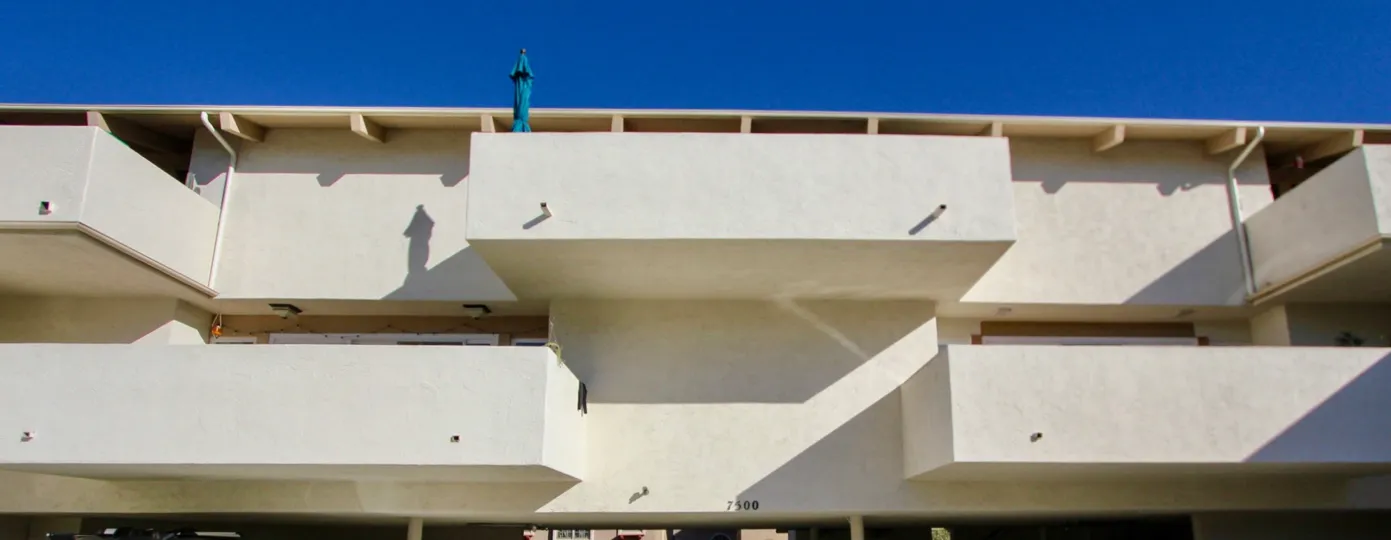Building with balconies and stairs in Flave La Costa of Carlsbad