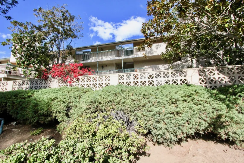 A SUNNY DAY IN THE GIBRALTAR VILLAS WITH THE BALCONIS, PLANTS, TREES