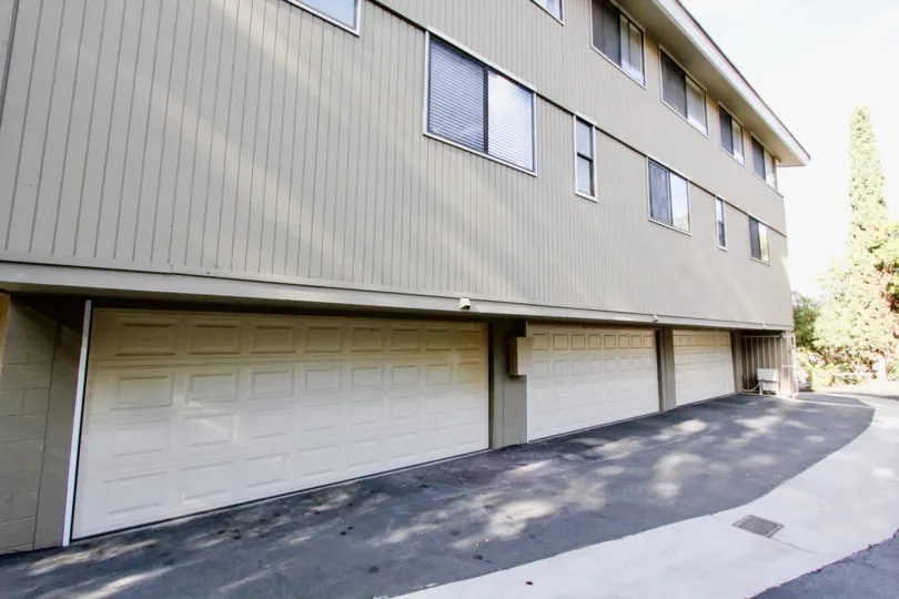 Some of the garages at Golf Crest community in Carlsbad, California on a sunny day