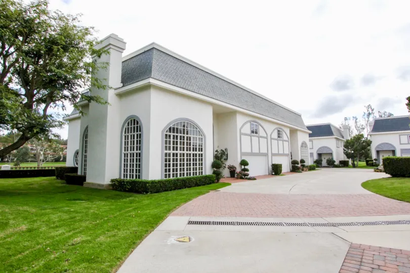 the jockey club is a white palace of the carlsbad city in ca
