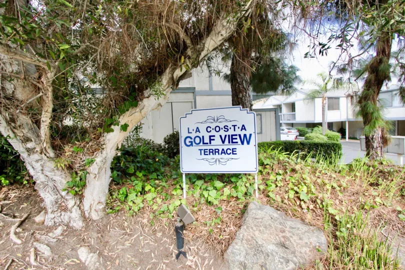 Villas with awesome trees and road sign in La Costa Golf view of Terrace in Carlsbad