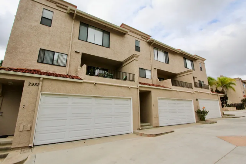 Three brown garages in La Costa Hills community of Carlsbad, CA