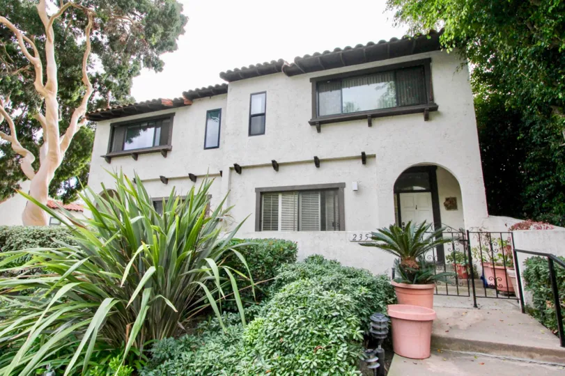 A day in the La Costa Pacific Villas with a house and plants.