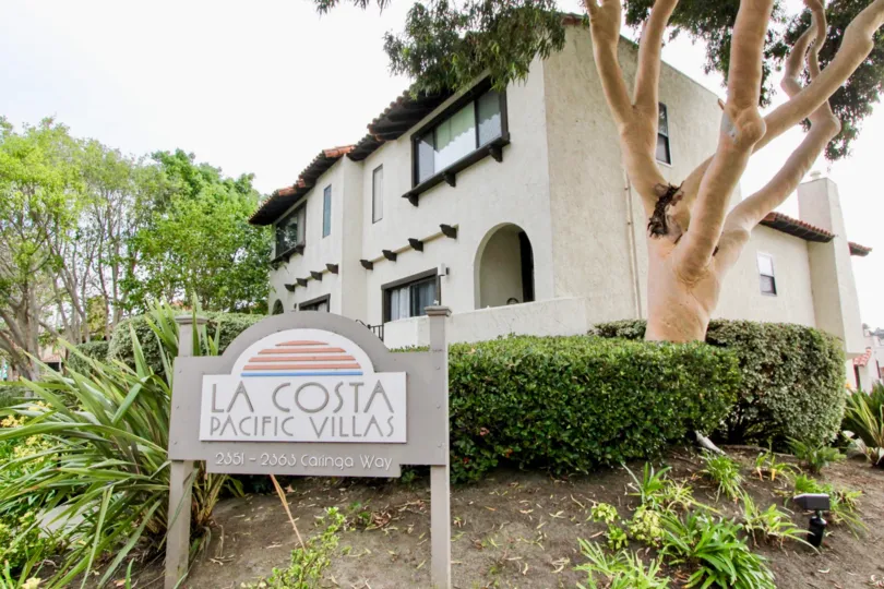 An adorable community sign on a hillside in La Costa Pacific Villas in Carlsbad CA