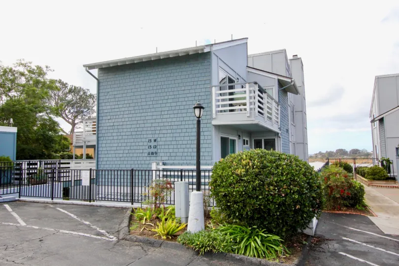A BUILDING WITH A LIGHT BLUE COLOURED HIGH WALL IN LAGUNA DE LOS PATOS
