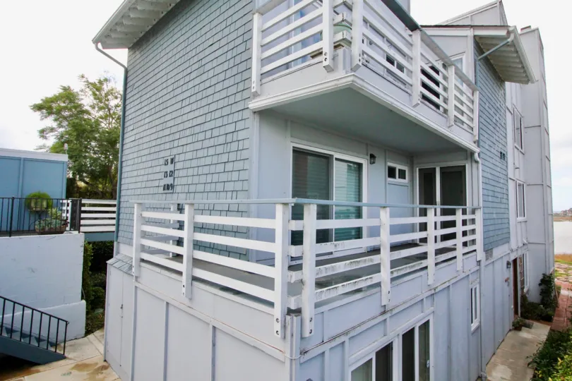 THE VILLAS IN THE LAGUNA DE LOS PATOS WITH THE UPSTAIRS, BALCONIS, PLANTS, TREES