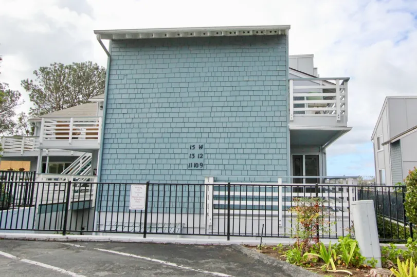 A BUILDING WITH A LIGHT BLUE COLOURED HIGH WALL IN LAGUNA DE LOS PATOS