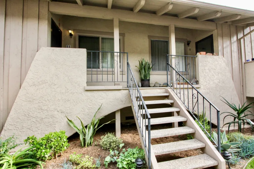 Front Porch with Stairs and bushes in the Majorca West Community in Carlsbad, CA.