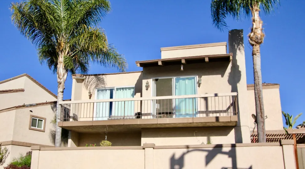 the meadowview townhomes is a wooden house of the carlsbad city in ca