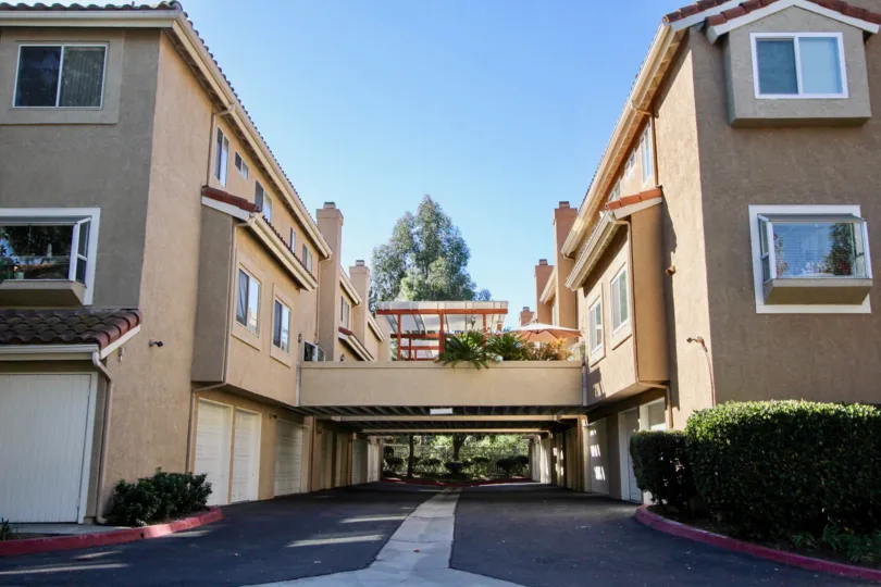 Two Buildings in Monarch Villas are connected by the Balcony has shed and umbrella