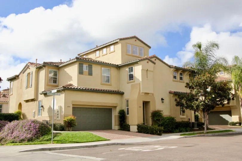 Villa having beautiful lawn and trees in front in Mystic Point of Carlsbad