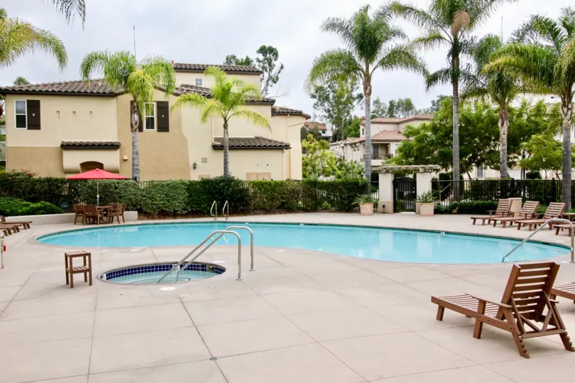 A day in the Portico with a blue color swimming pool.