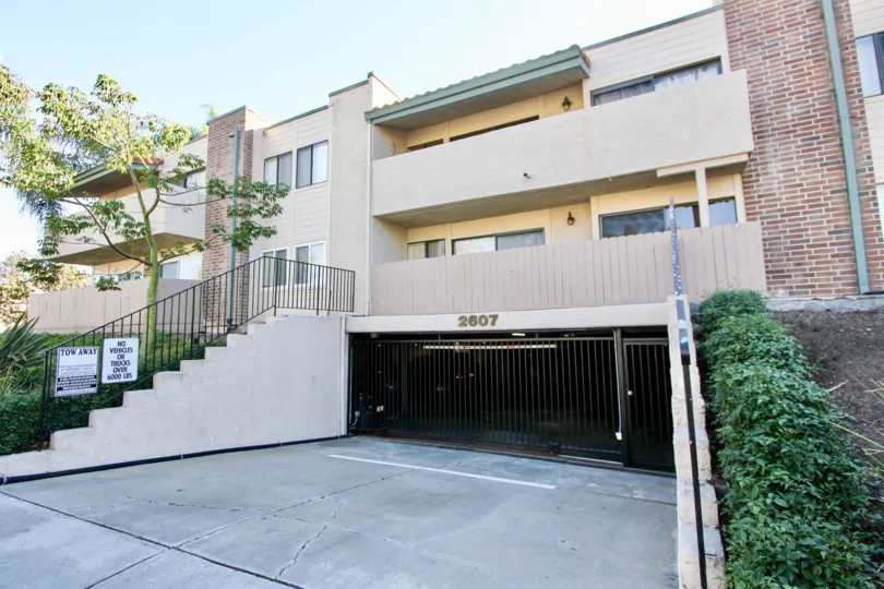 THE 2607 APARTMENT IN THE SABRINA GREENS WITH THE STEEL GATE, PLANTS, TREES, UPSTAIRS