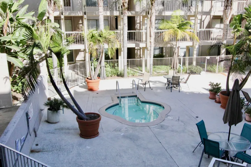 A bright day in the Tres Verde with a small swimming pool.