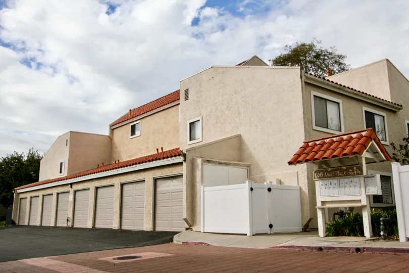 Building and mailbox views at West Bluff Hills community in Carlsbad, CA