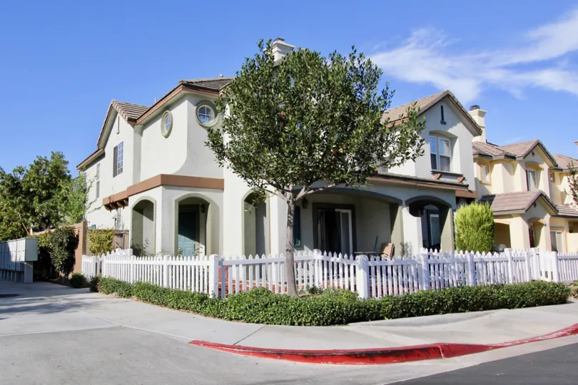 An Independent Villa with Trees in front and gated area on roadside of Belleme Chateaux of Chula Vista