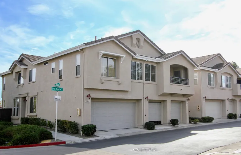 Corner unit at the Bolero with large garage, street view.