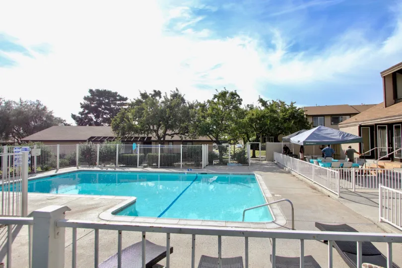 A SUNNY DAY WITH NO PEOPLE IN THE SWIMMING POOL OF BONITA TERRACE