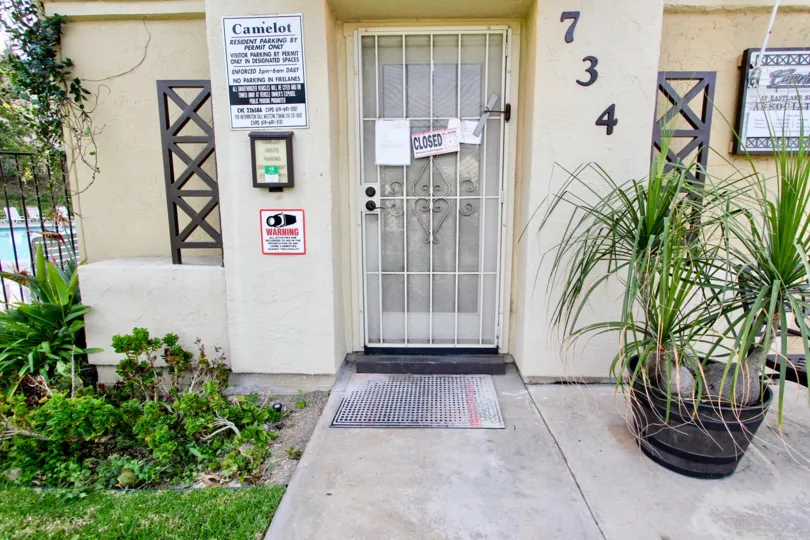 Front entrance of the building 734 have a board CLOSED in Camelot