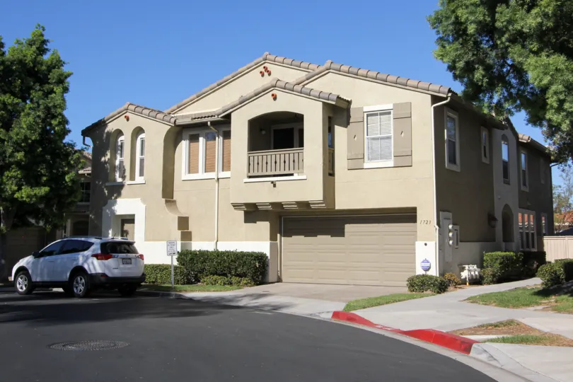 The exterior view of the garage and the Capri Building in Chula Vista