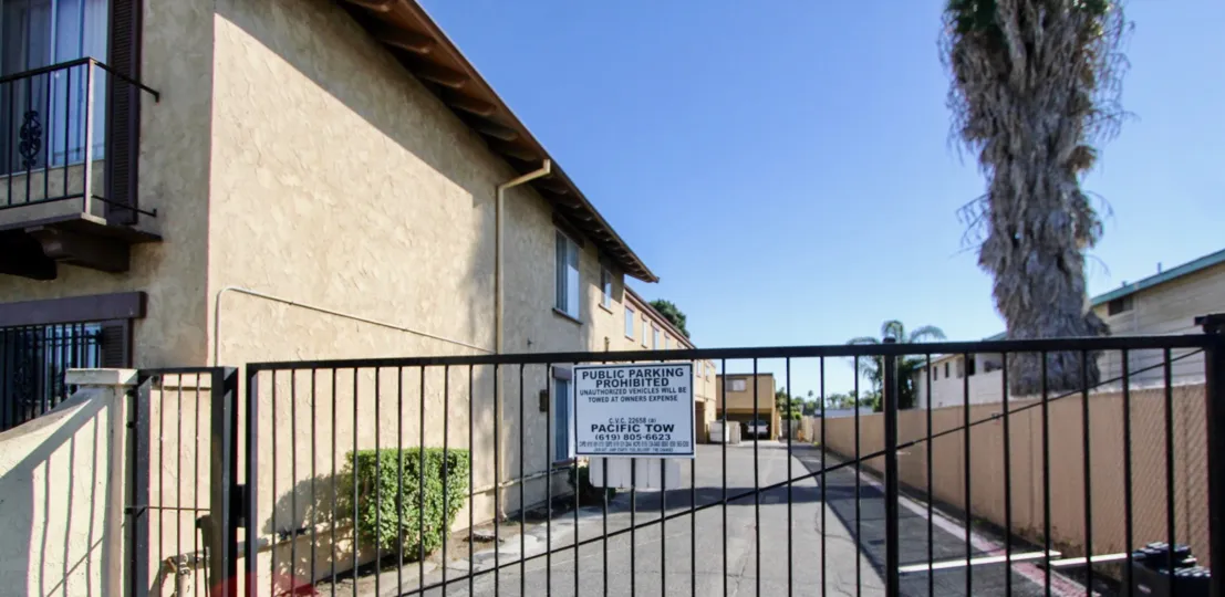 THE APARTMENT IN THE CASA DE MOSS WITH THE PUBLIC PARKING PROHIBITED BOARD